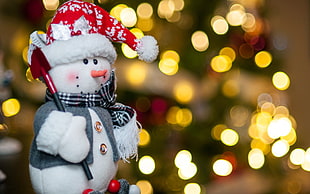 selective focus photography of Snowman plush toy HD wallpaper